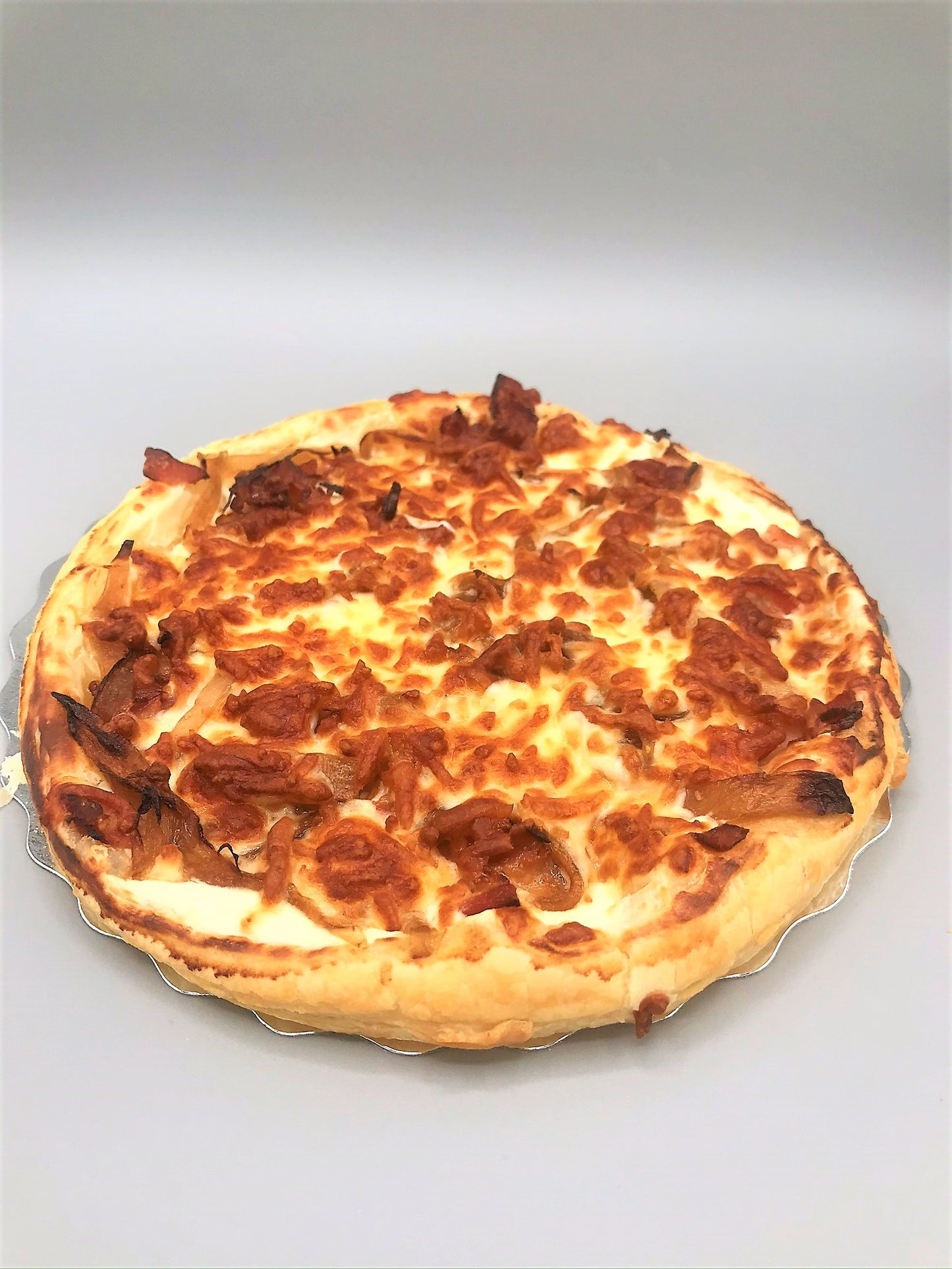Tarte flambée ,oignon ,fromage.
